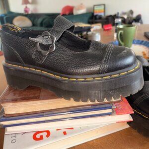 Doc Marten's black platform Mary Jane's with flower clasp.
